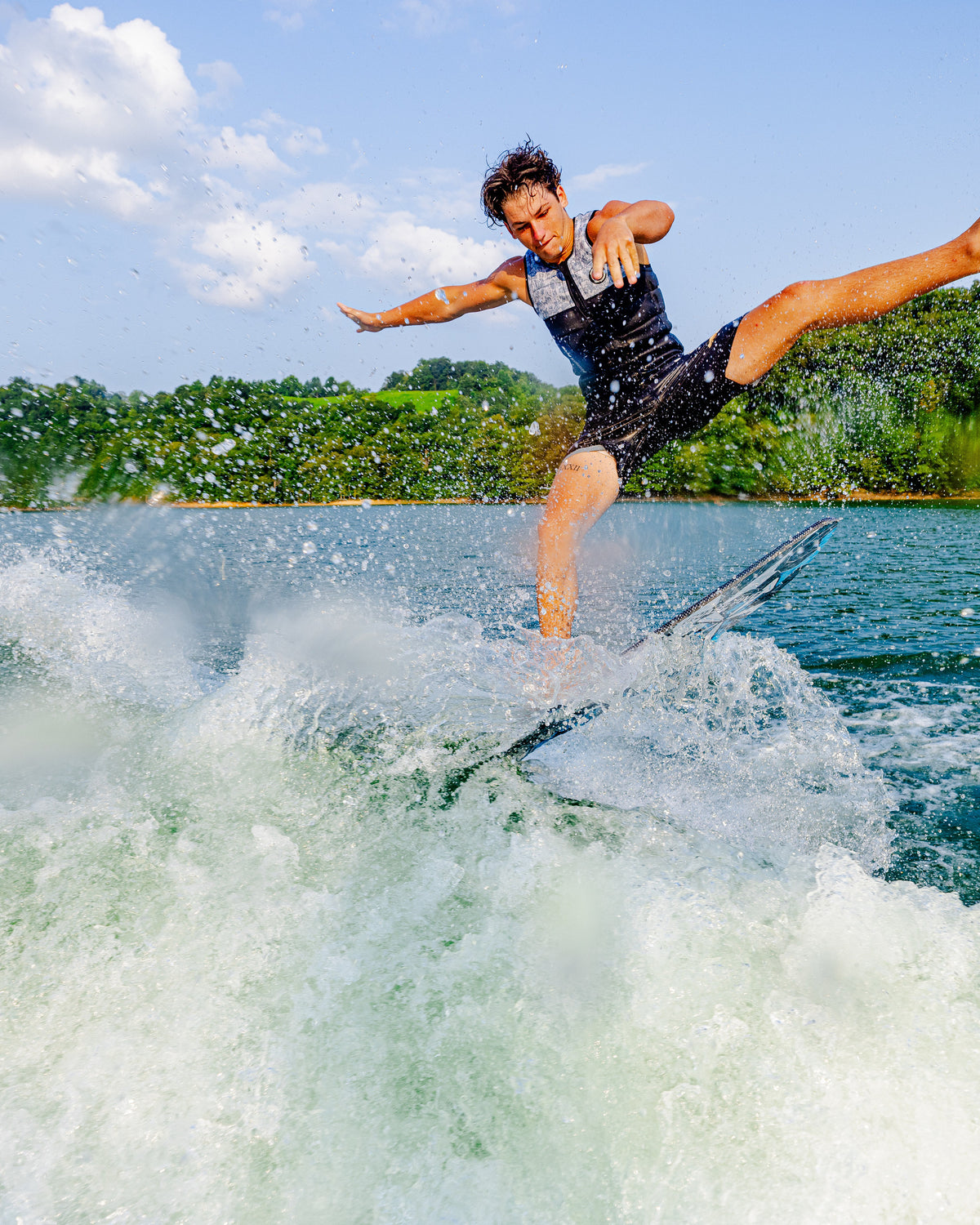 2027 Phase Five Key Jett Shreds wakesurf board action photo