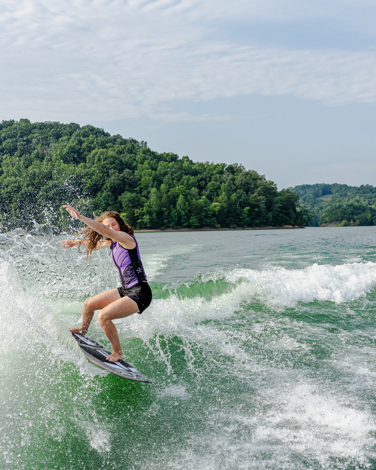 2027 Phase Five Rush Stealth wakesurf board action photo
