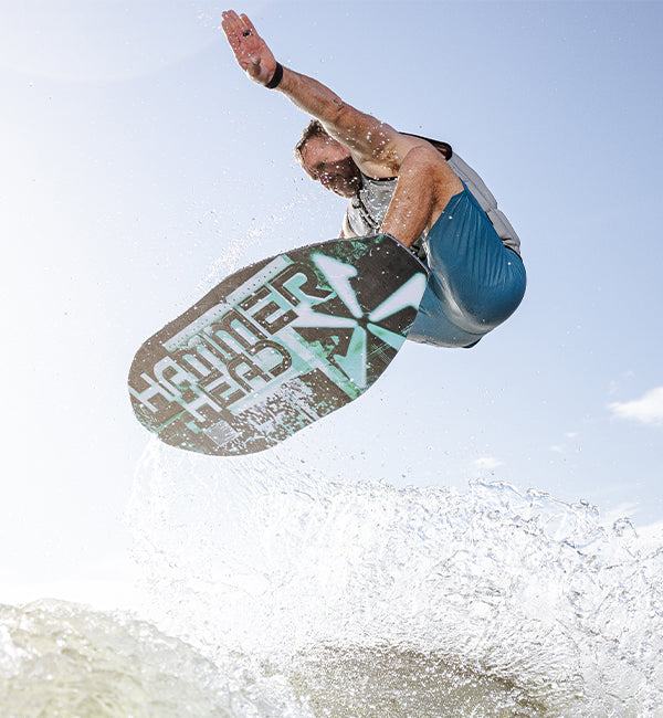 Drew Danielo wakesurfing on a Phase Five Hammerhead board