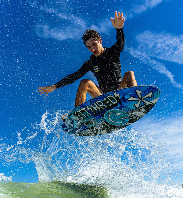 Jett Lambert wakesurfing on a Phase Five Key Jett Shreds board
