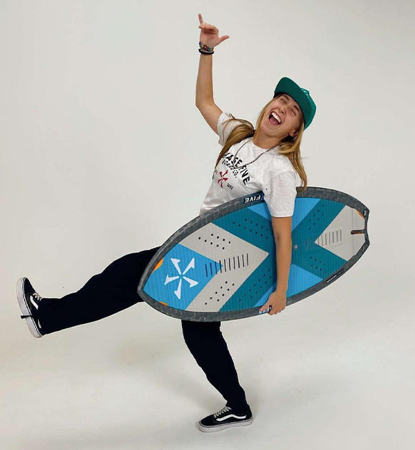 Lindsay Hovsepian wakesurfing on a Phase Five board