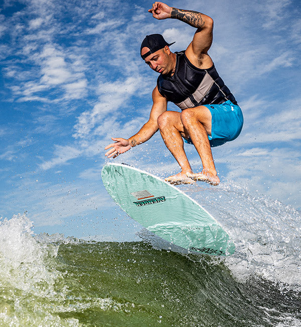Mo Hamoui wakesurfing on a Phase Five board