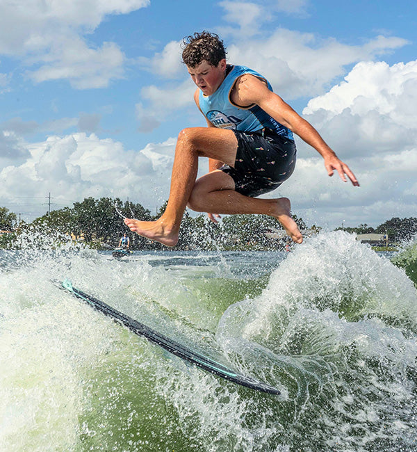Sutton Smith wakesurfing on a Phase Five board