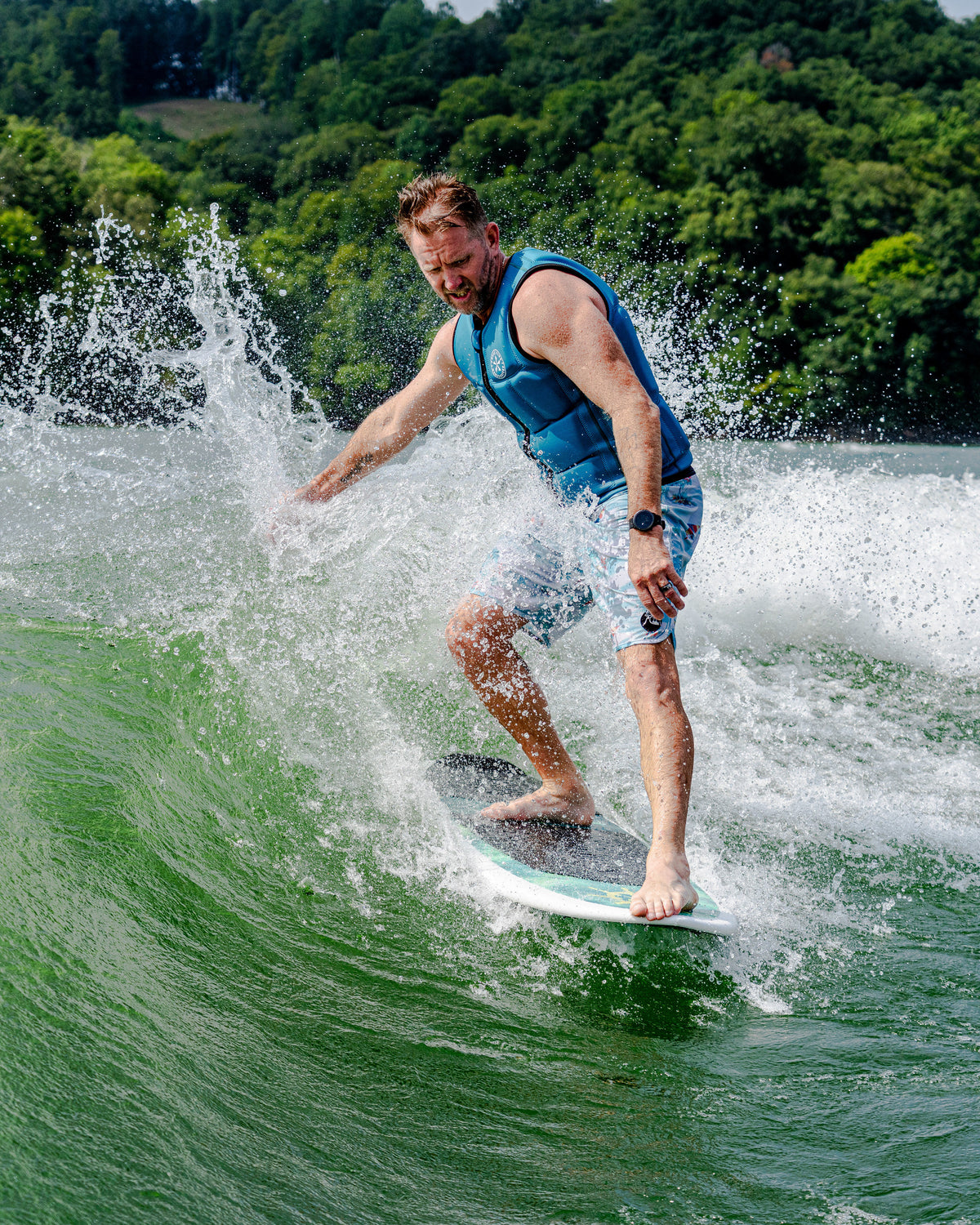2027 Phase Five Cap'tin wakesurf board action photo
