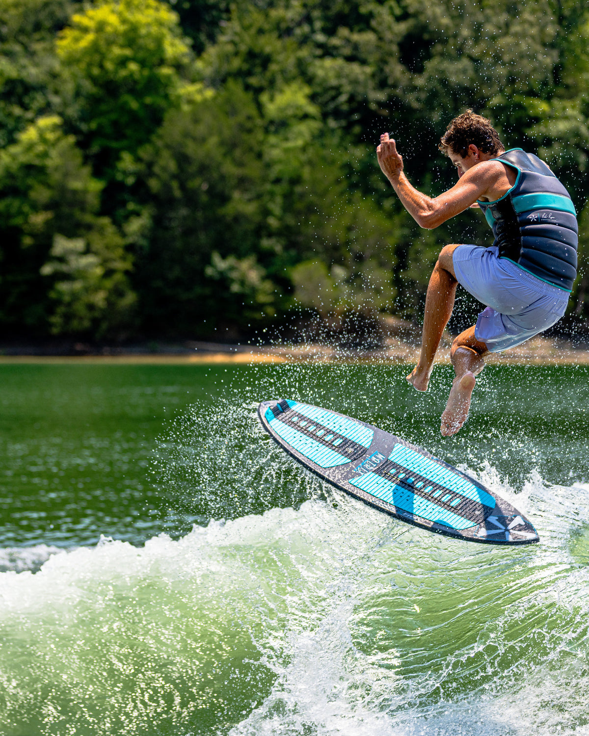 2027 Phase Five Matrix Pro wakesurf board action photo