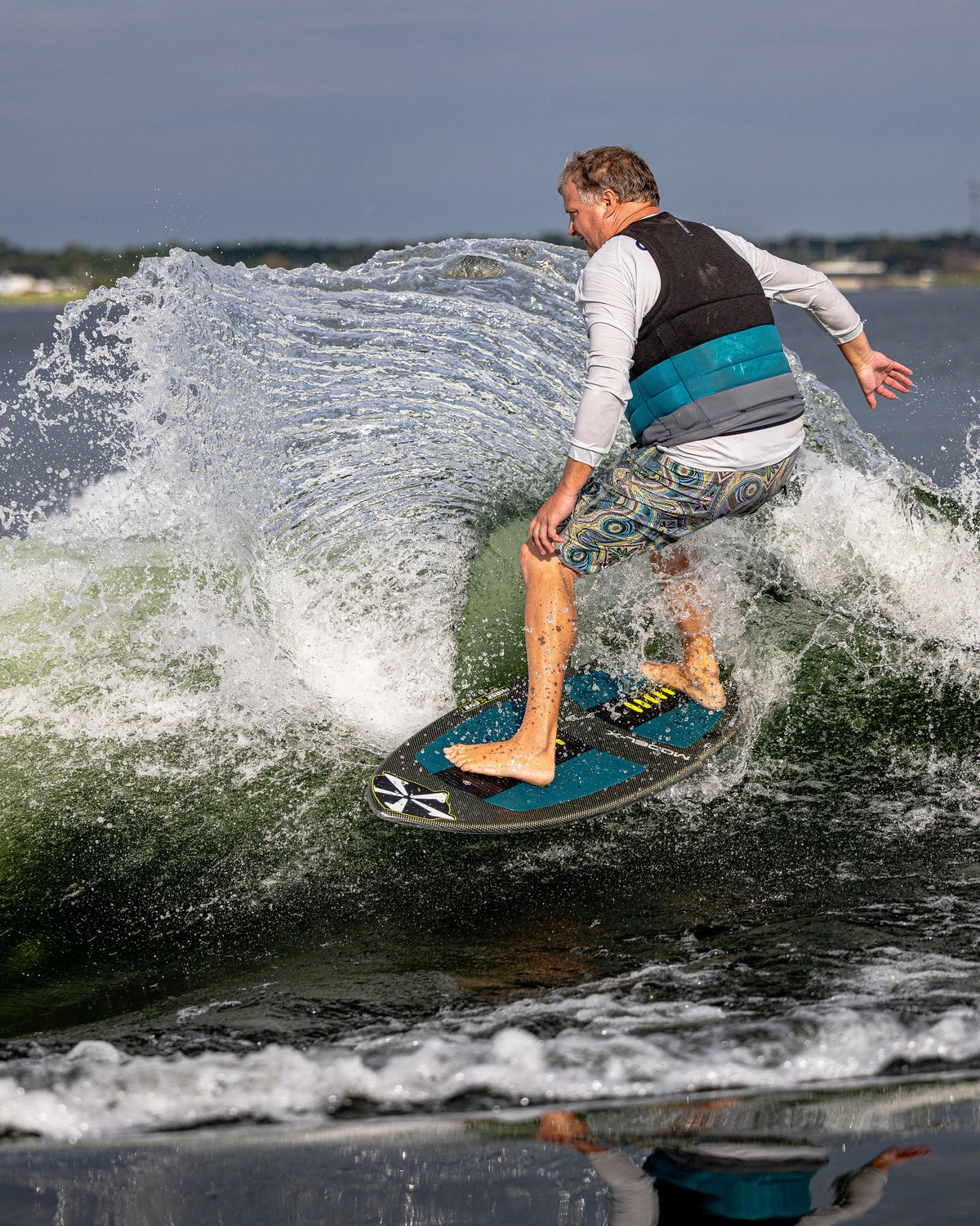 2027 Phase Five Model X wakesurf board action photo