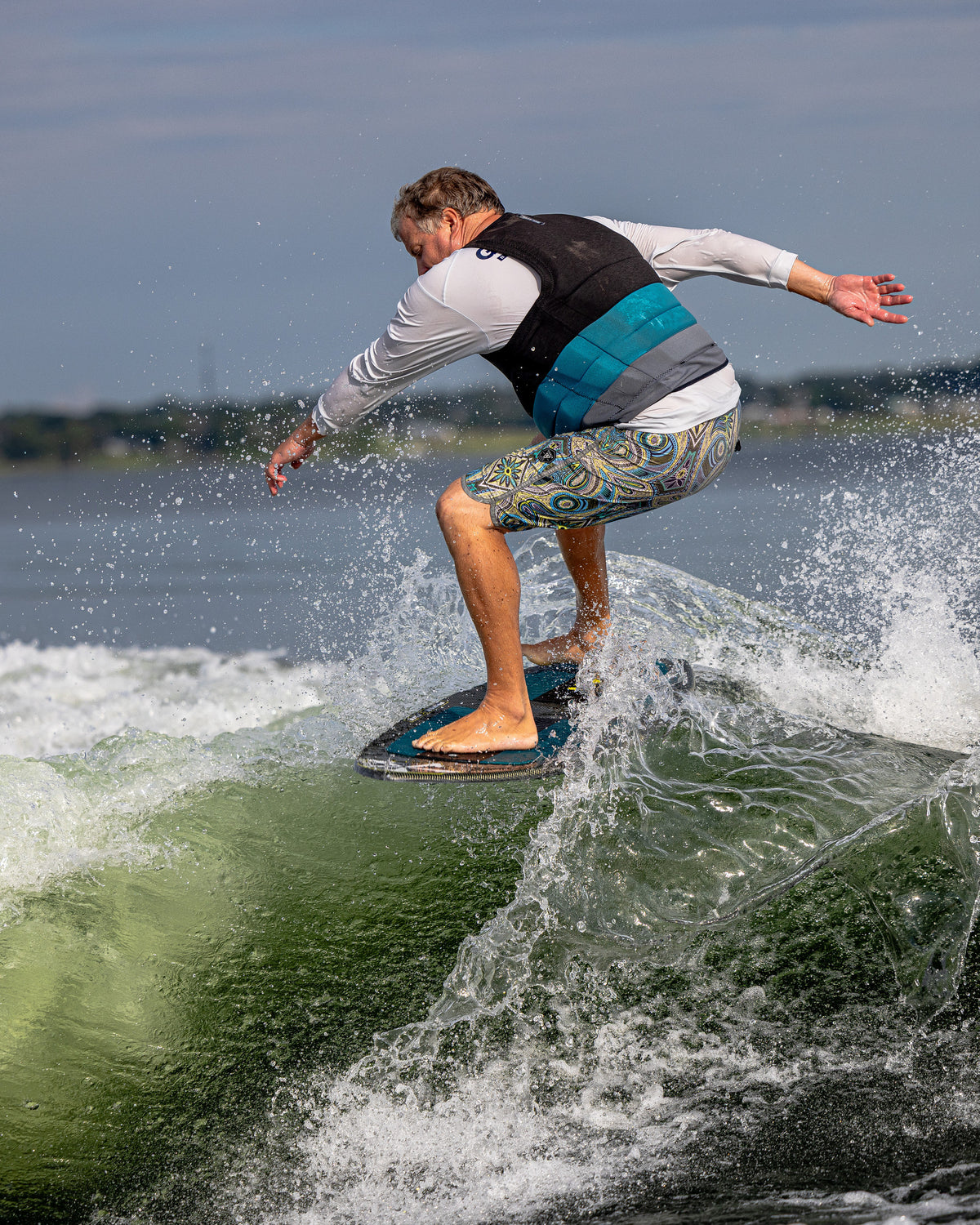 2027 Phase Five Model X wakesurf board action photo