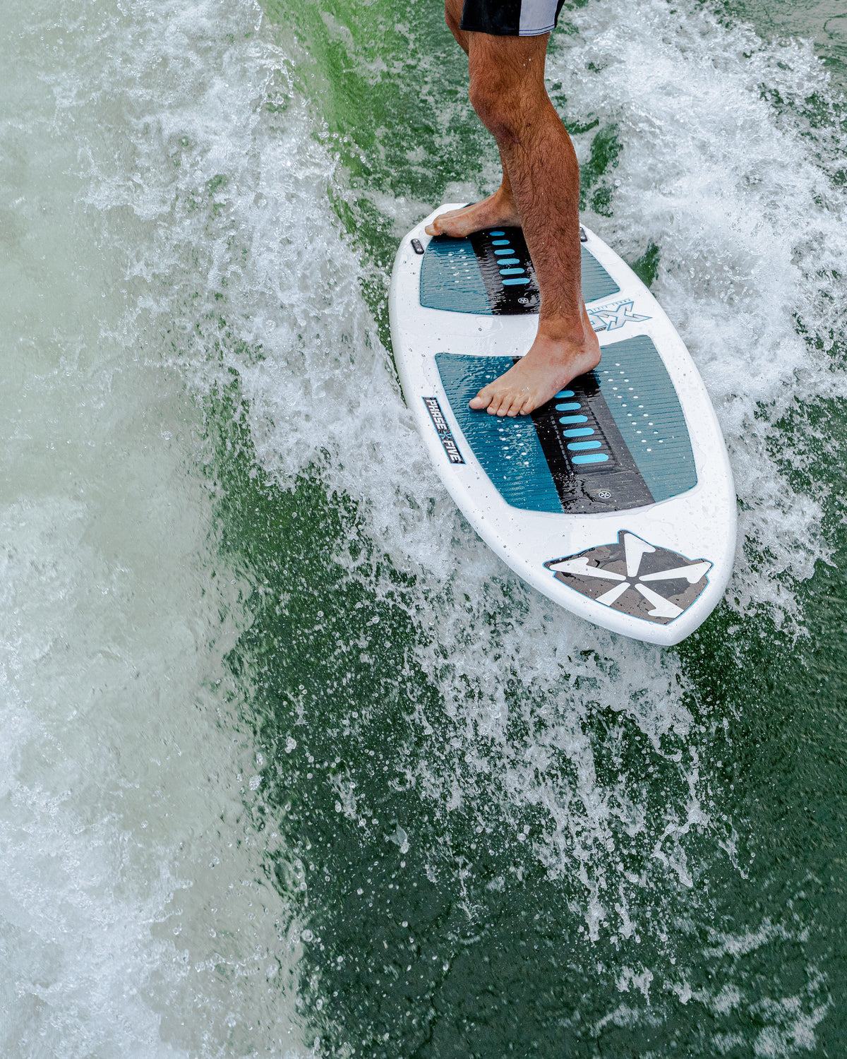 2027 Phase Five XB wakesurf board action photo