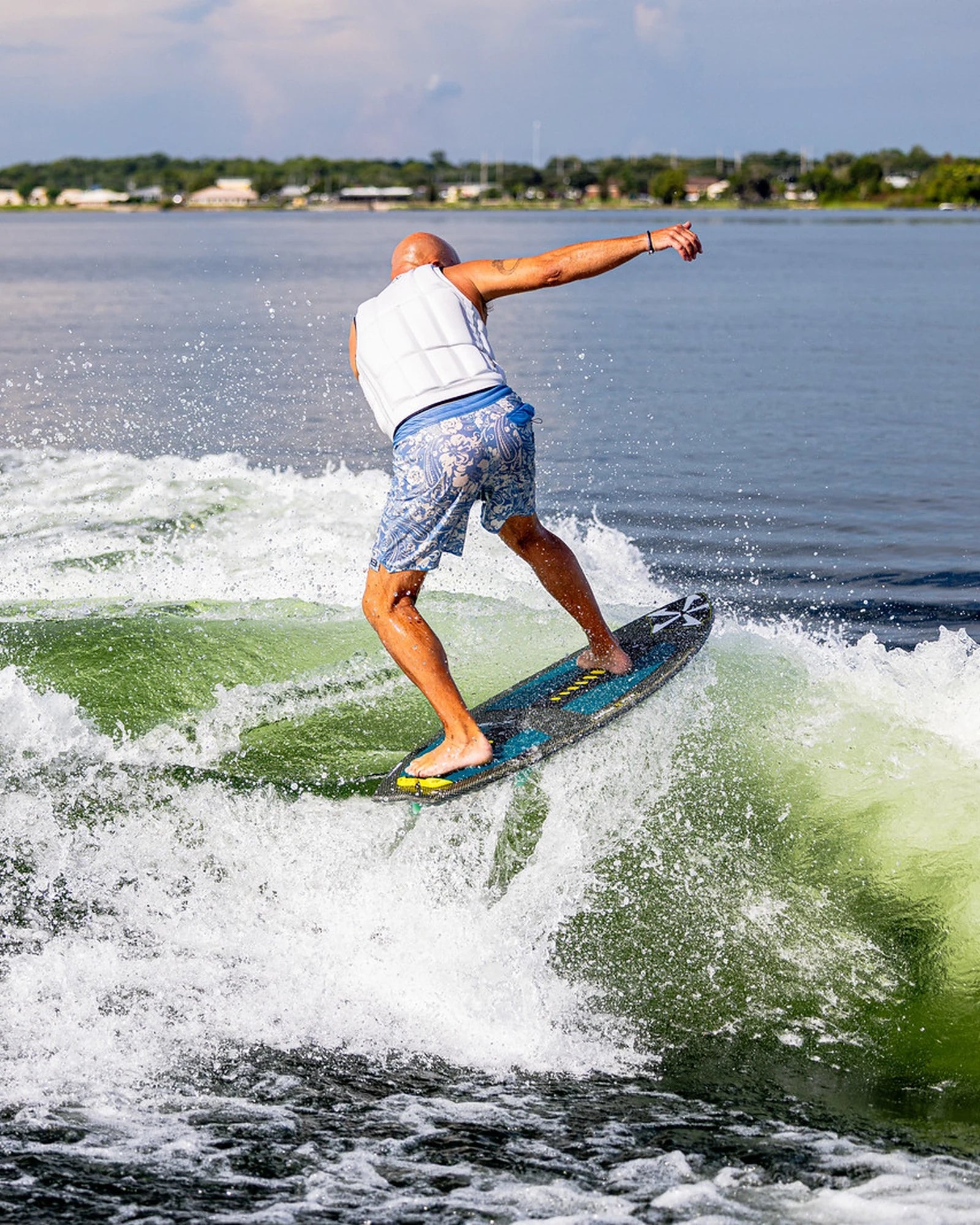 2027 Phase Five Model X wakesurf board action photo