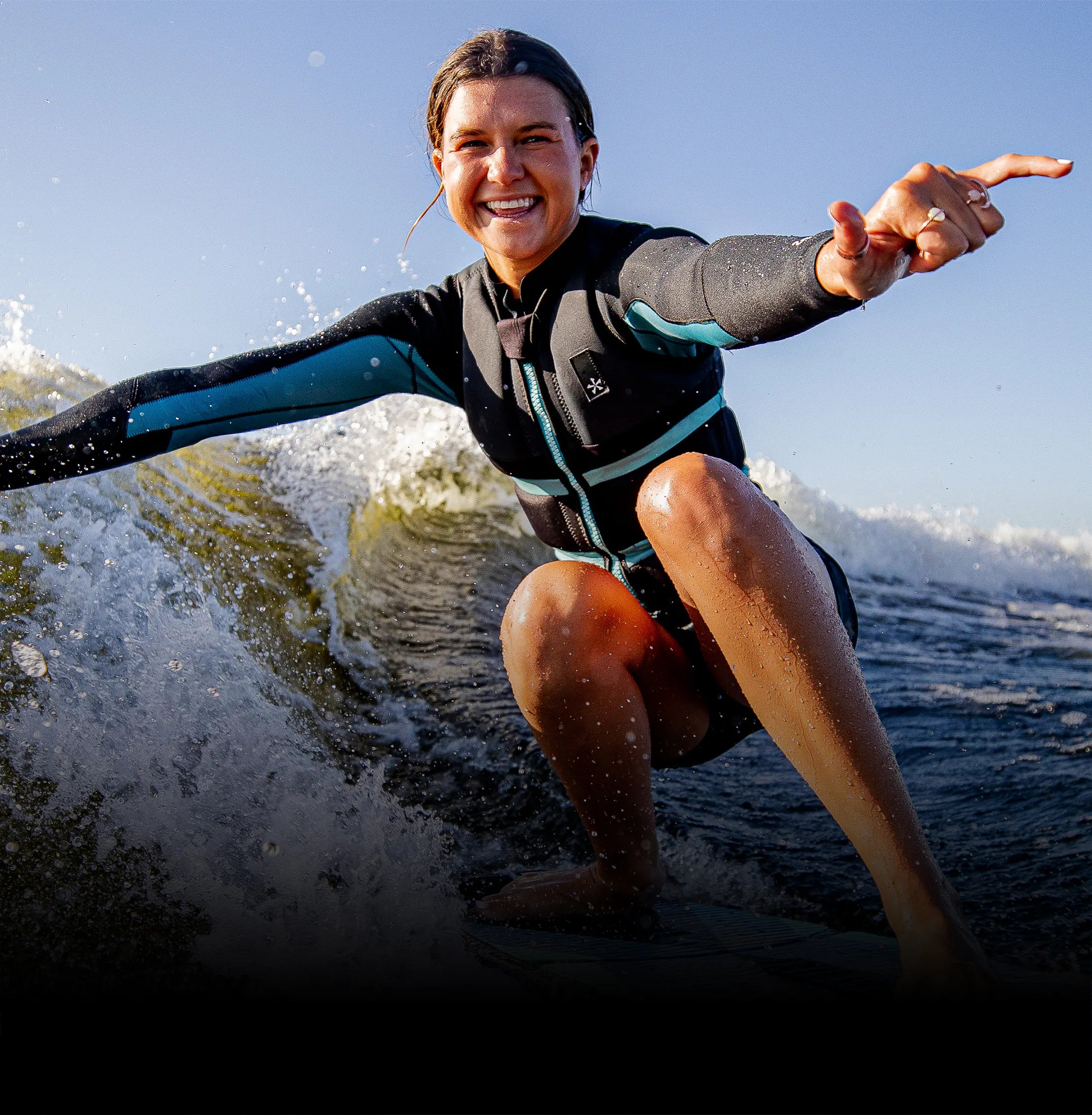 Wakesurfer wearing Phase 5 wetsuit gear