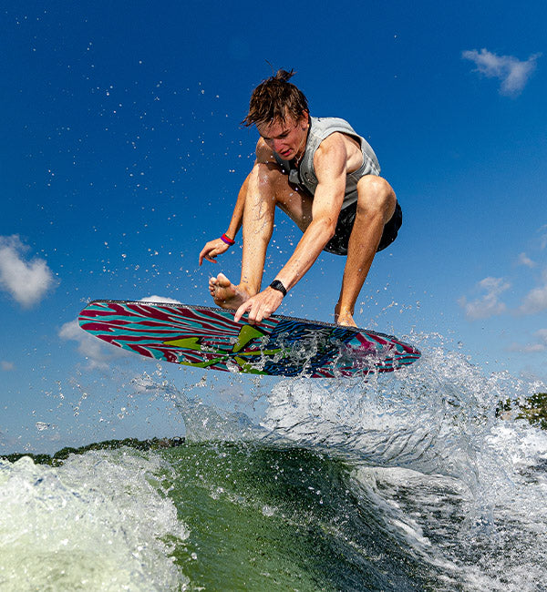 Afton Bank wakesurfing on a Phase Five board