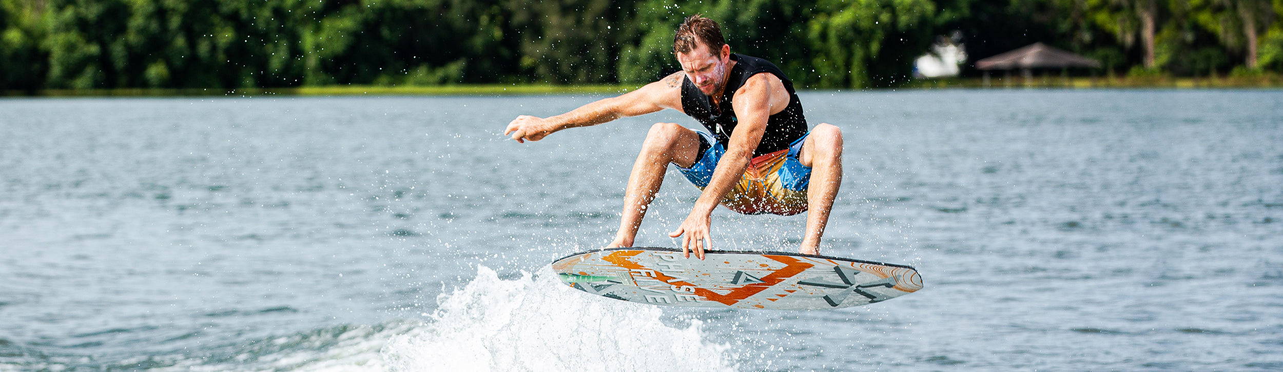 Drew Danielo wakesurfing on a Phase Five board