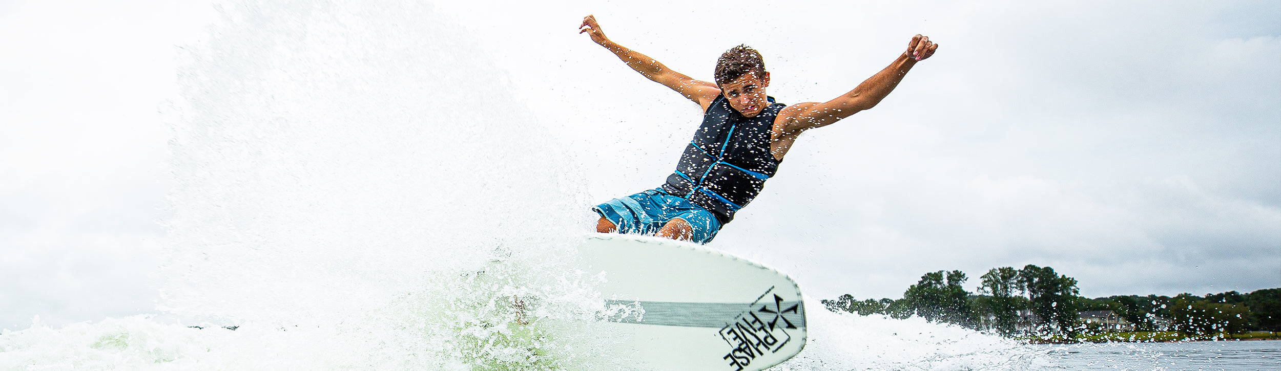 Parker Payne wakesurfing on a Phase Five board