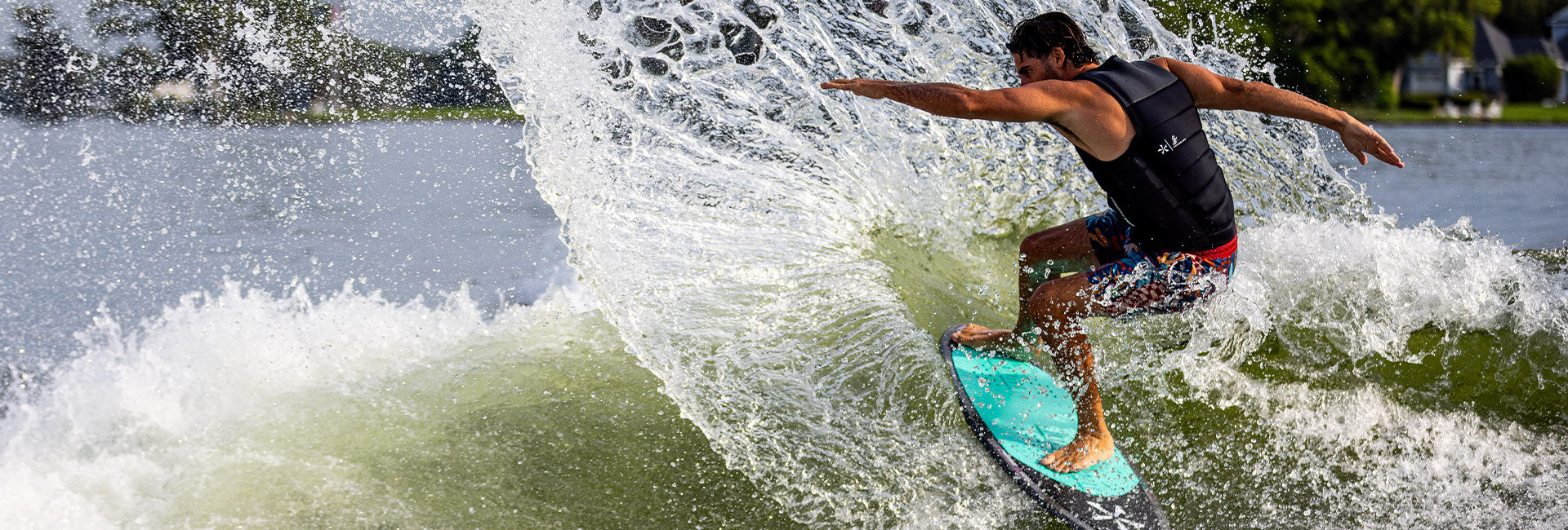 Sean Silveira carving on a Phase Five wakesurf board